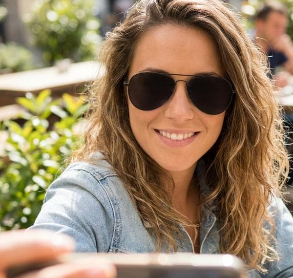 Dating profile photo with sunglasses obstruction