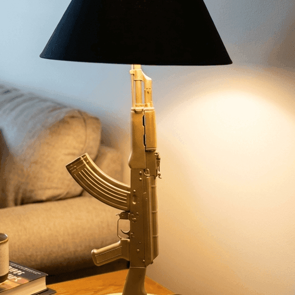 Gun-shaped lamp in living room — context determines if weapon imagery is a violation