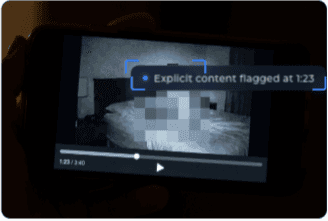 Video player UI flagging explicit content at a timestamp — Lasso AI video moderation