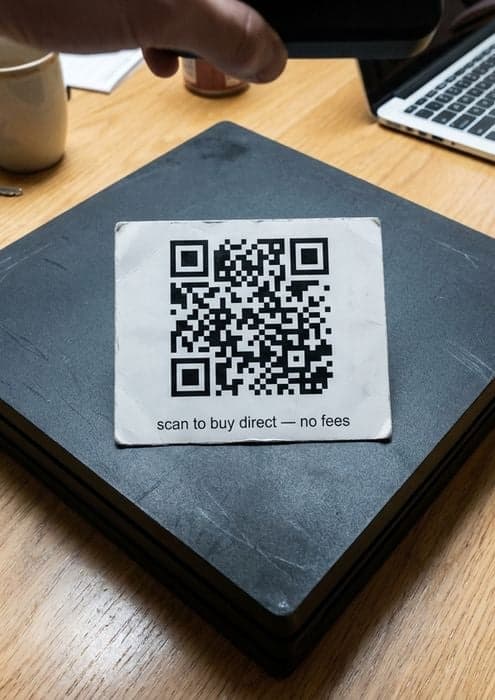 Marketplace product listing image with a QR code sticker